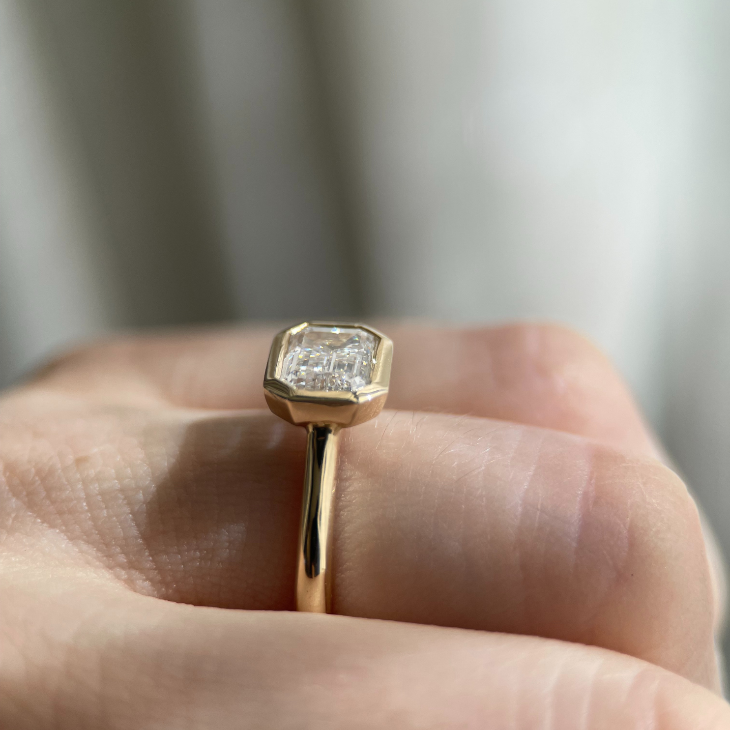 Romy Ring - lab-grown 1.55ct D VVS2 emerald cut