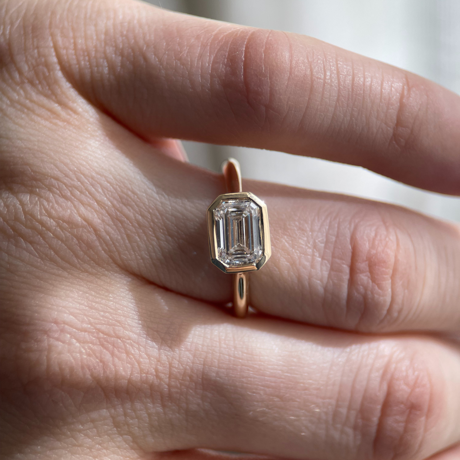Romy Ring - lab-grown 1.55ct D VVS2 emerald cut