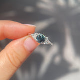 1.58ct sparkly teal sapphire and diamond trilogy